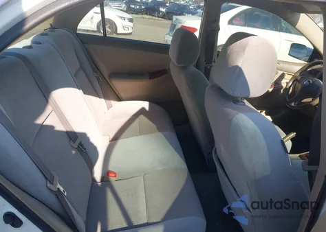 2004 Toyota Corolla Le z USA, uszkodzony, nr VIN JTDBR32EX42044932